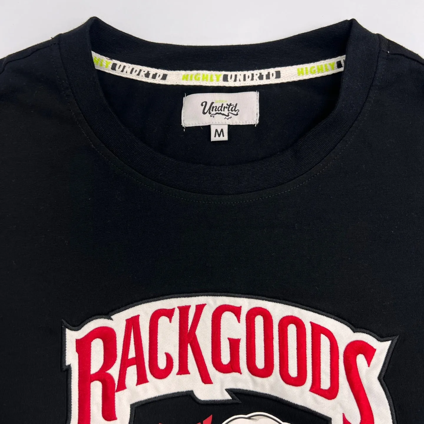 HIGHLY UNDRTD Rackgoods Graphic T-Shirt